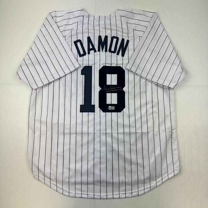 Autographed/Signed Johnny Damon New York Pinstripe Jersey Beckett COA