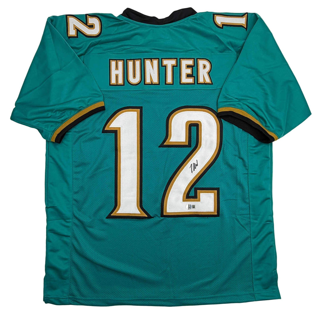 Autographed/Signed Travis Hunter Jacksonville Teal Retro Jersey Beckett BAS COA