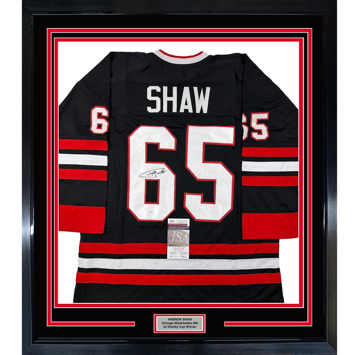 Framed Autographed/Signed Andrew Shaw 35x39 Chicago Black Hockey Jersey JSA COA