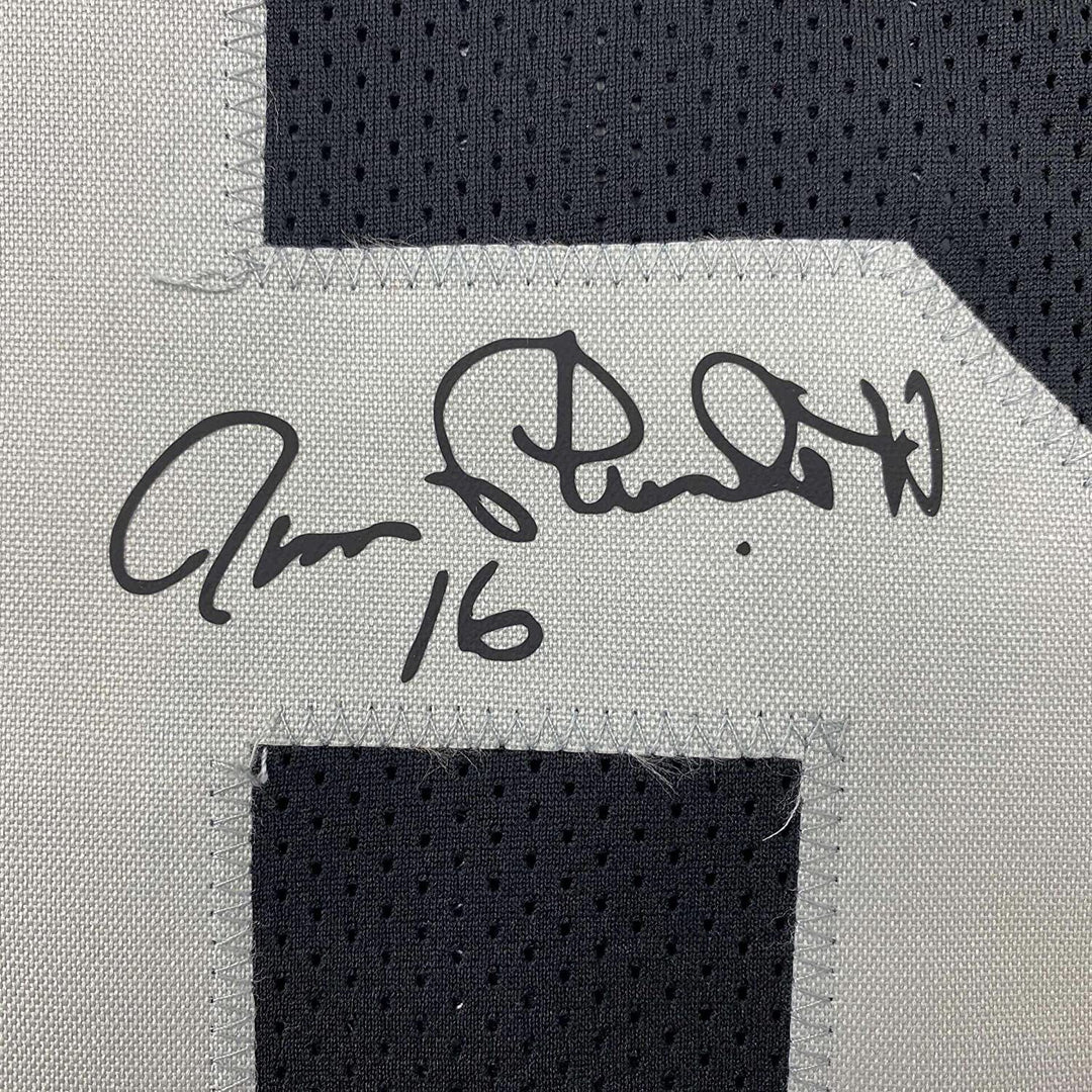Framed Facsimile Autographed Jim Plunkett 33x42 Black Reprint Laser Auto Jersey
