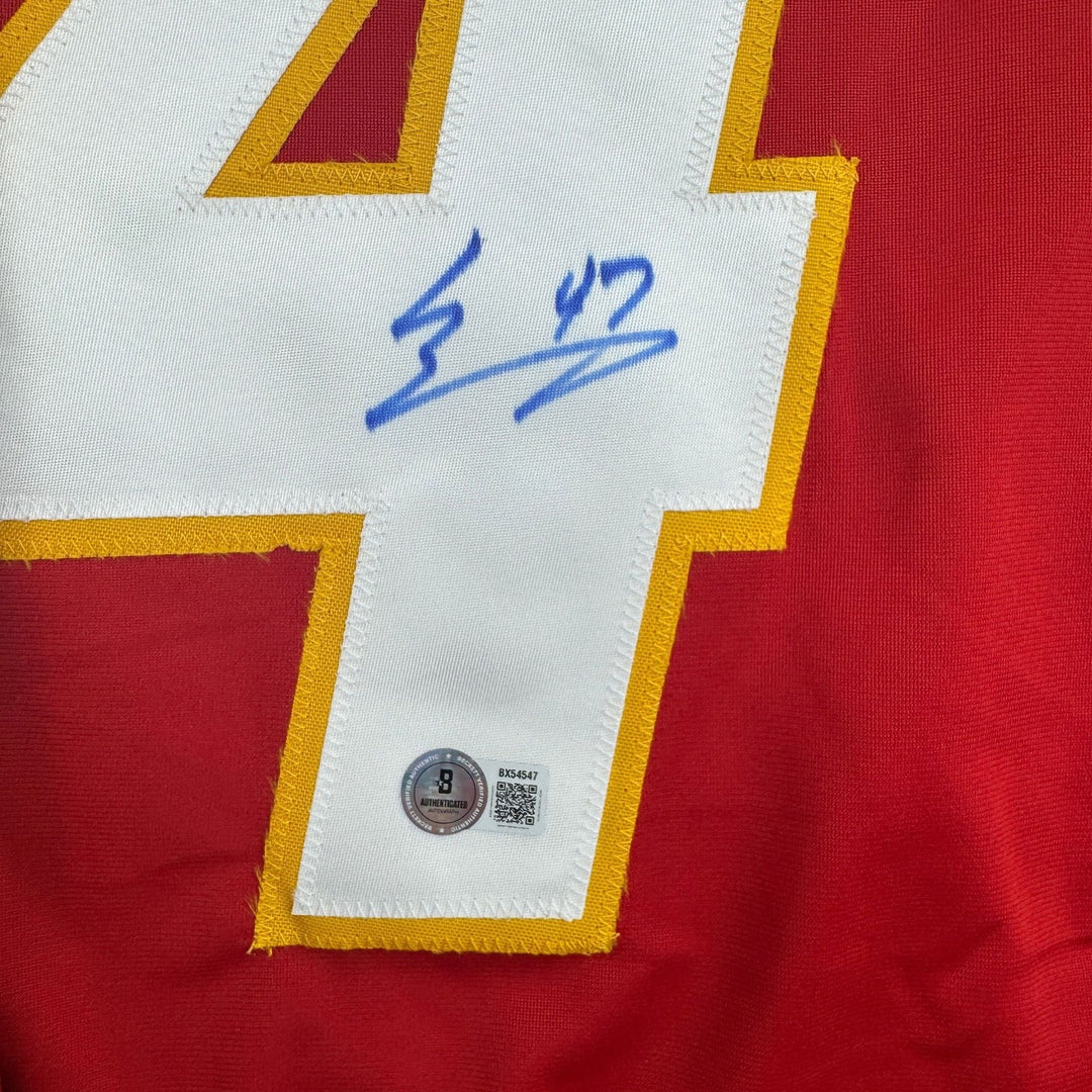 Autographed/Signed Connor Zary Calgary Red Hockey Jersey Beckett BAS COA