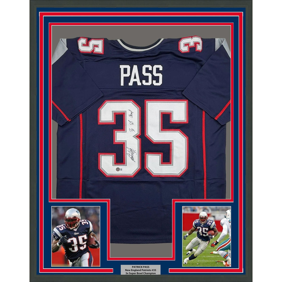 Framed Autographed/Signed Patrick Pass 35x39 NE Blue Jersey Beckett BAS COA