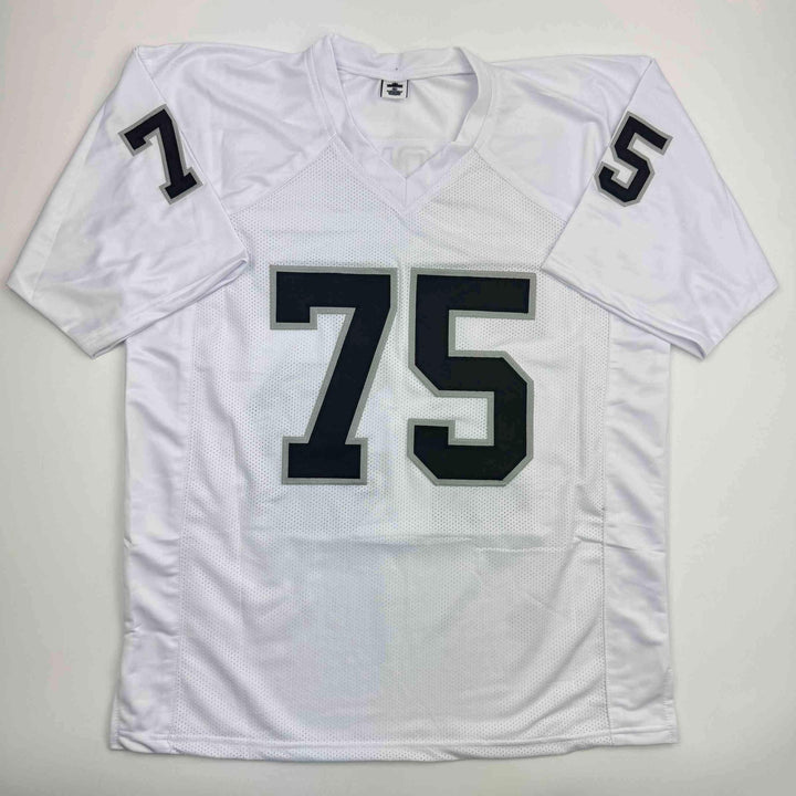 Autographed/Signed Howie Long Oakland White Football Jersey Beckett BAS COA