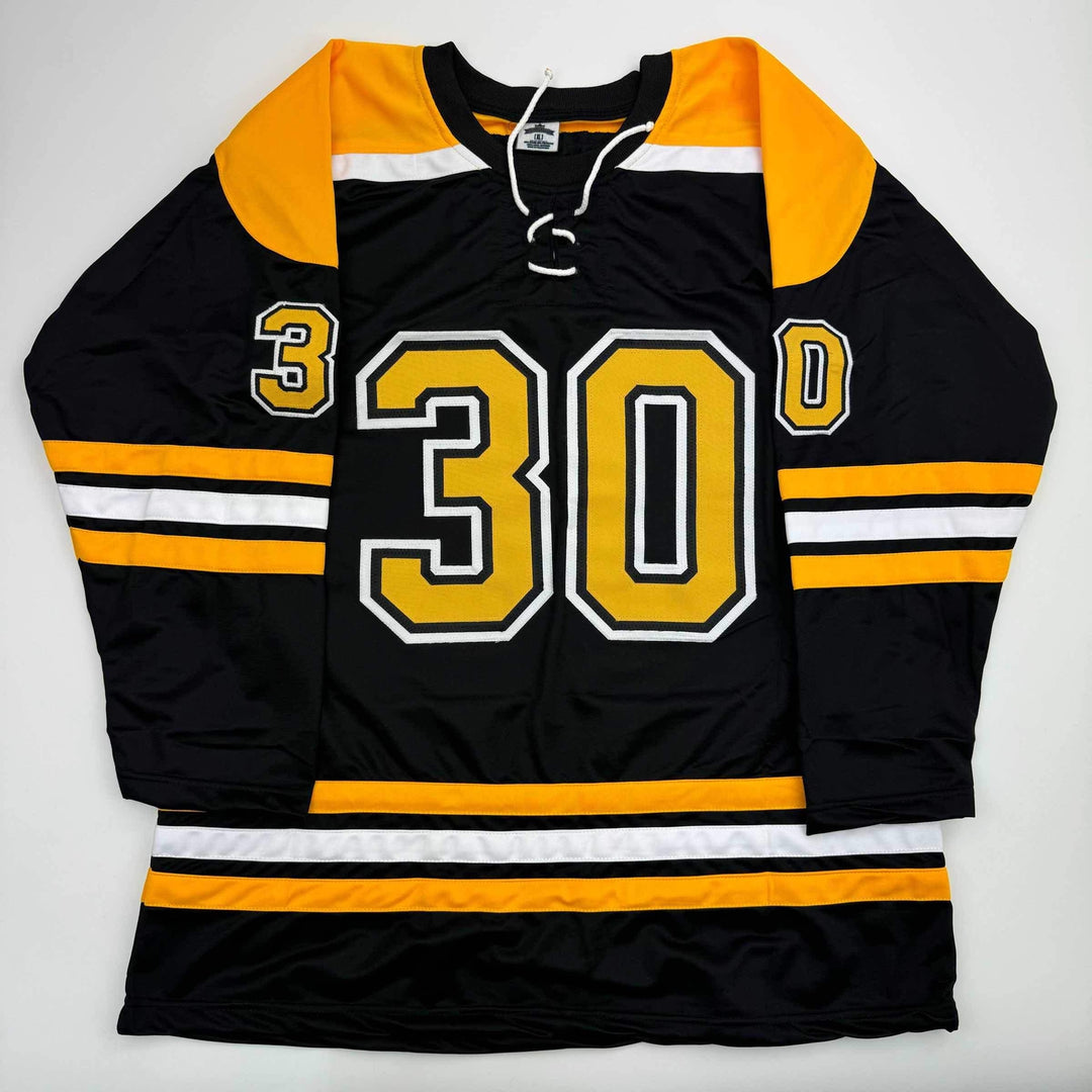 Autographed/Signed Tim Thomas Boston Black Hockey Jersey JSA COA