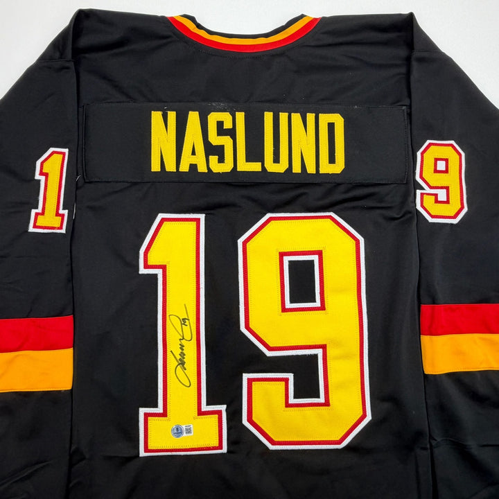 Autographed/Signed Markus Naslund Vancouver Black Hockey Jersey Beckett COA