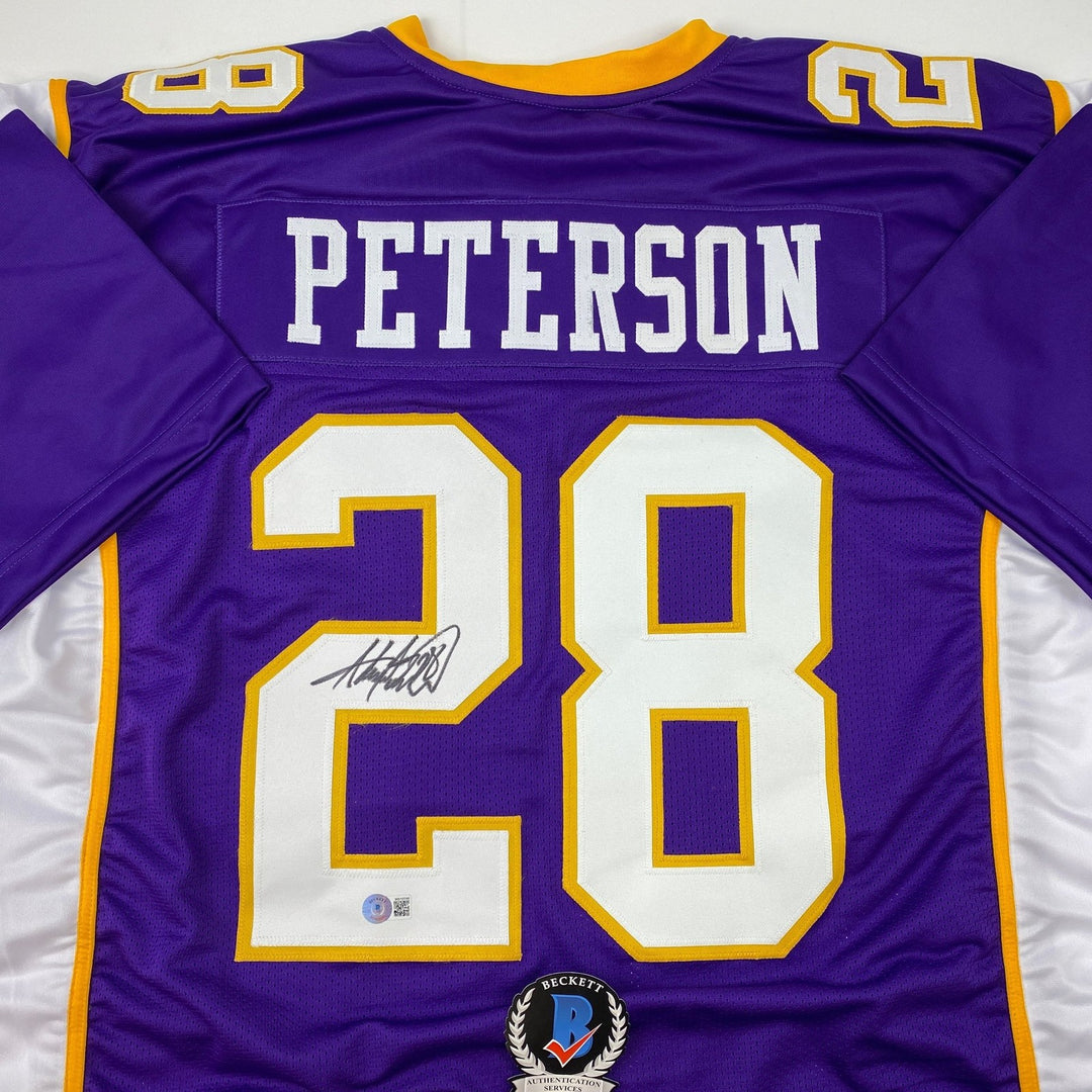 Autographed/Signed Adrian Peterson Minnesota Purple Jersey Beckett COA