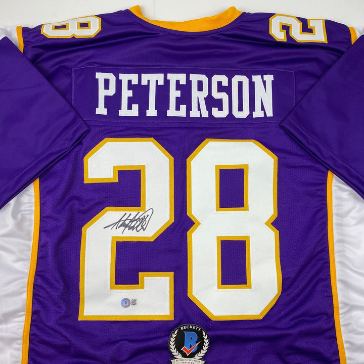 Autographed/Signed Adrian Peterson Minnesota Purple Jersey Beckett COA