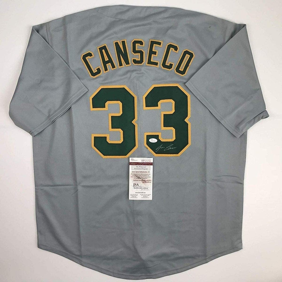 Autographed/Signed JOSE CANSECO Oakland Grey Baseball Jersey JSA COA Auto