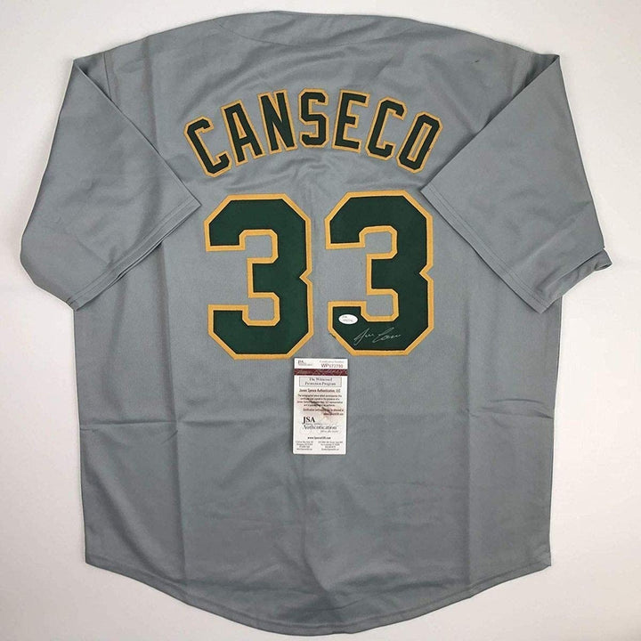 Autographed/Signed JOSE CANSECO Oakland Grey Baseball Jersey JSA COA Auto