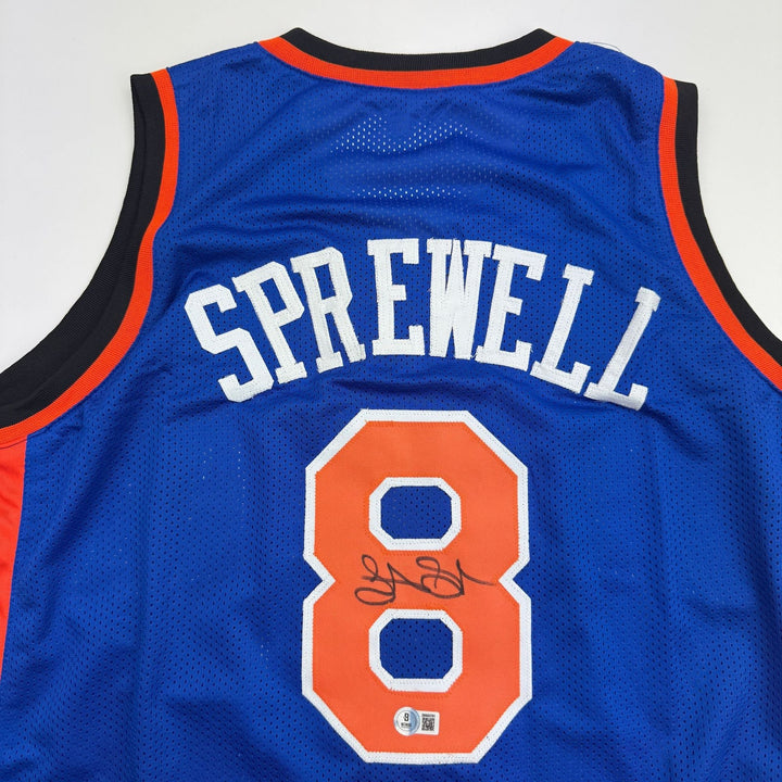 Autographed/Signed Latrell Sprewell New York Blue Basketball Jersey BAS COA