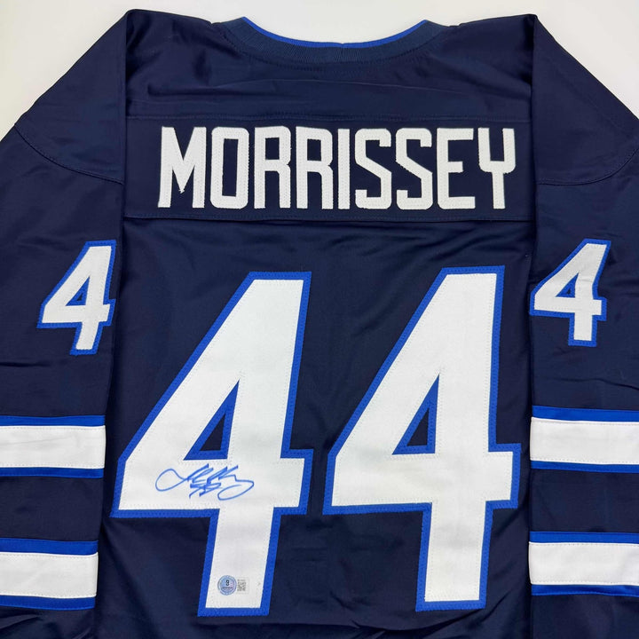 Autographed/Signed Josh Morrissey Winnipeg Blue Jersey Beckett BAS COA