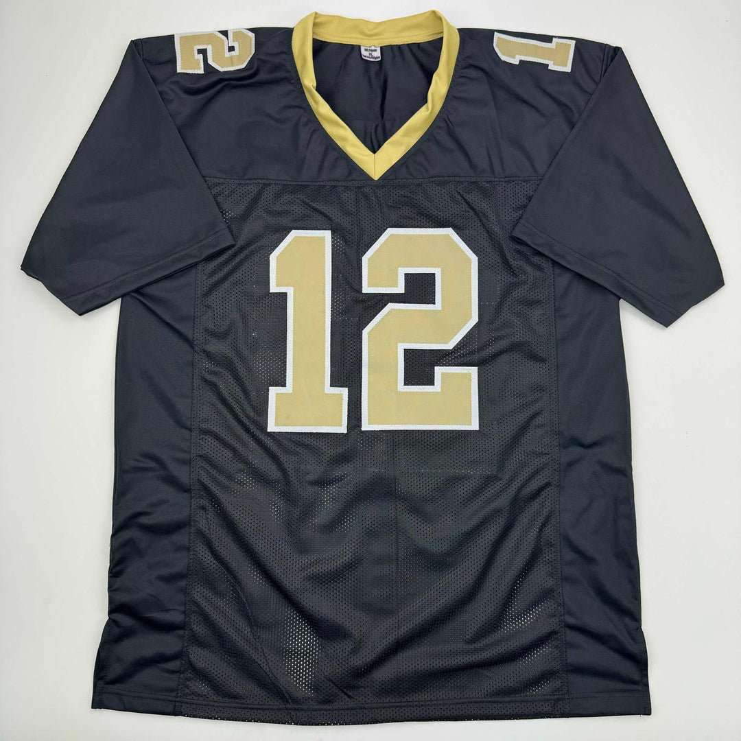 Autographed/Signed Chris Olave New Orleans Black Jersey Beckett BAS COA