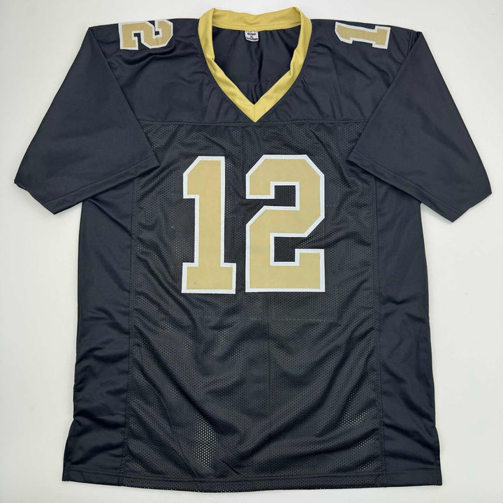 Autographed/Signed Chris Olave New Orleans Black Jersey Beckett BAS COA