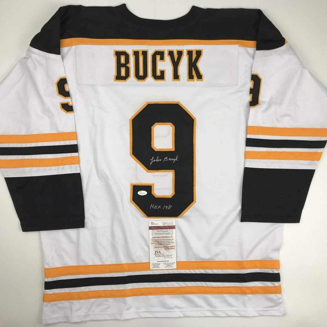 Autographed/Signed Johnny John Bucyk HOF 1981 Boston White Jersey JSA COA