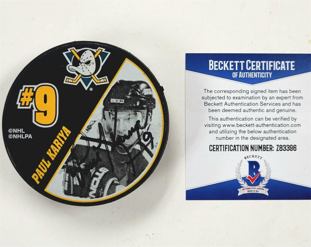Teemu Selanne & Paul Kariya signed Anaheim Ducks Puck autograph (A) Beckett BAS