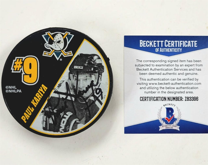 Teemu Selanne & Paul Kariya signed Anaheim Ducks Puck autograph (A) Beckett BAS