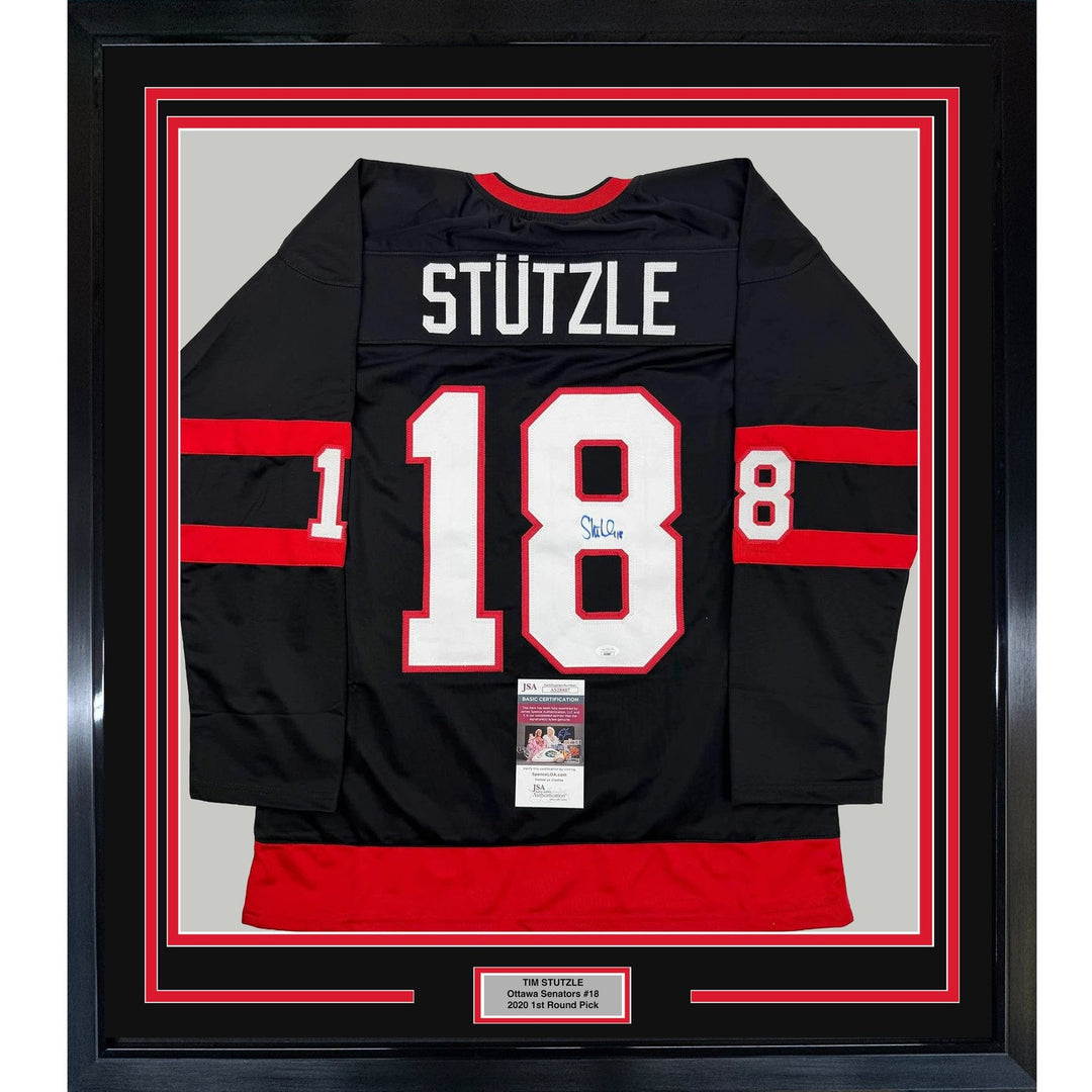 Framed Autographed/Signed Tim Stutzle 35x39 Ottawa Black Jersey JSA COA