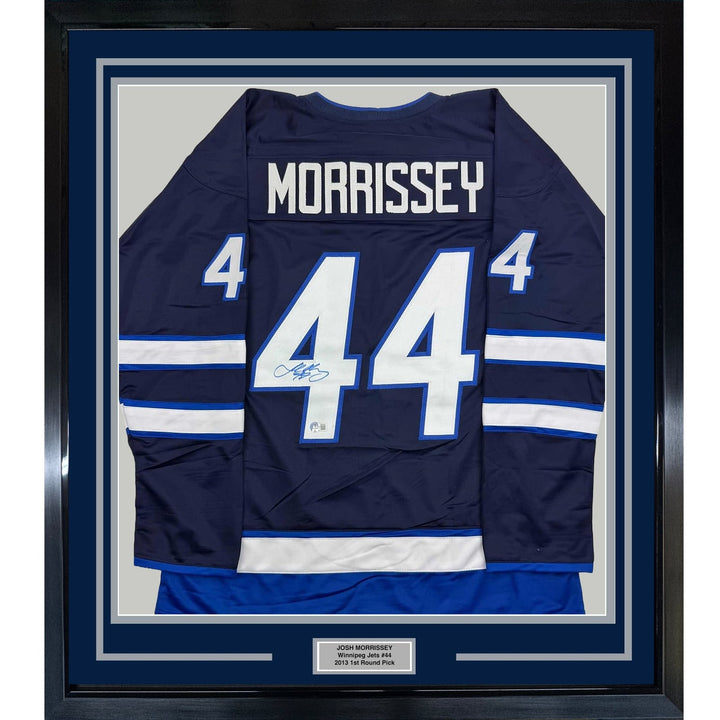 Framed Autographed/Signed Josh Morrissey 35x39 Blue Jersey Beckett COA