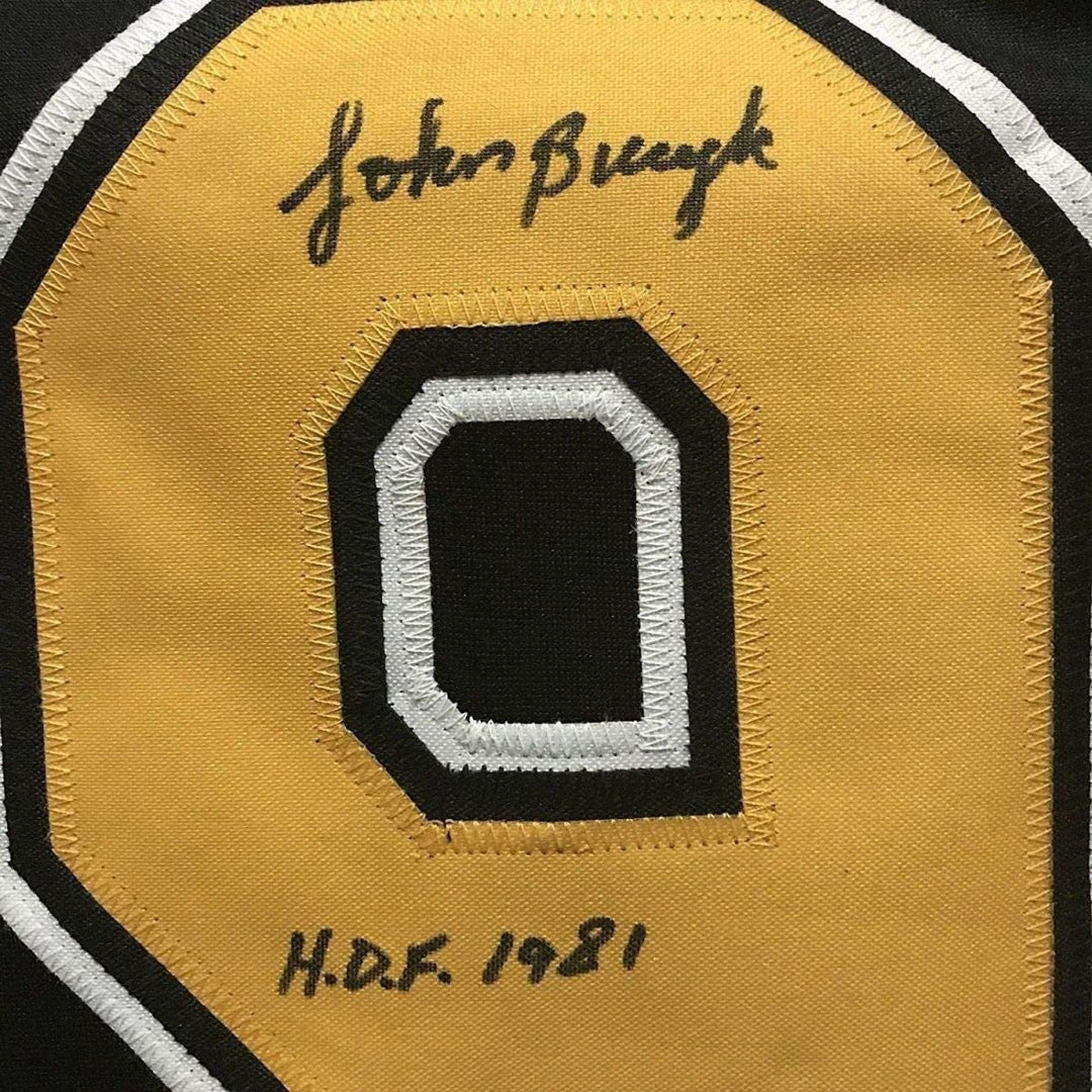 FRAMED Autographed/Signed JOHNNY BUCYK 33x42 Boston Black Jersey JSA COA