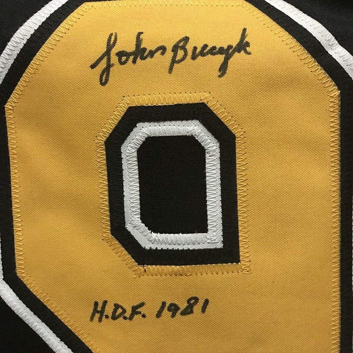 FRAMED Autographed/Signed JOHNNY BUCYK 33x42 Boston Black Jersey JSA COA
