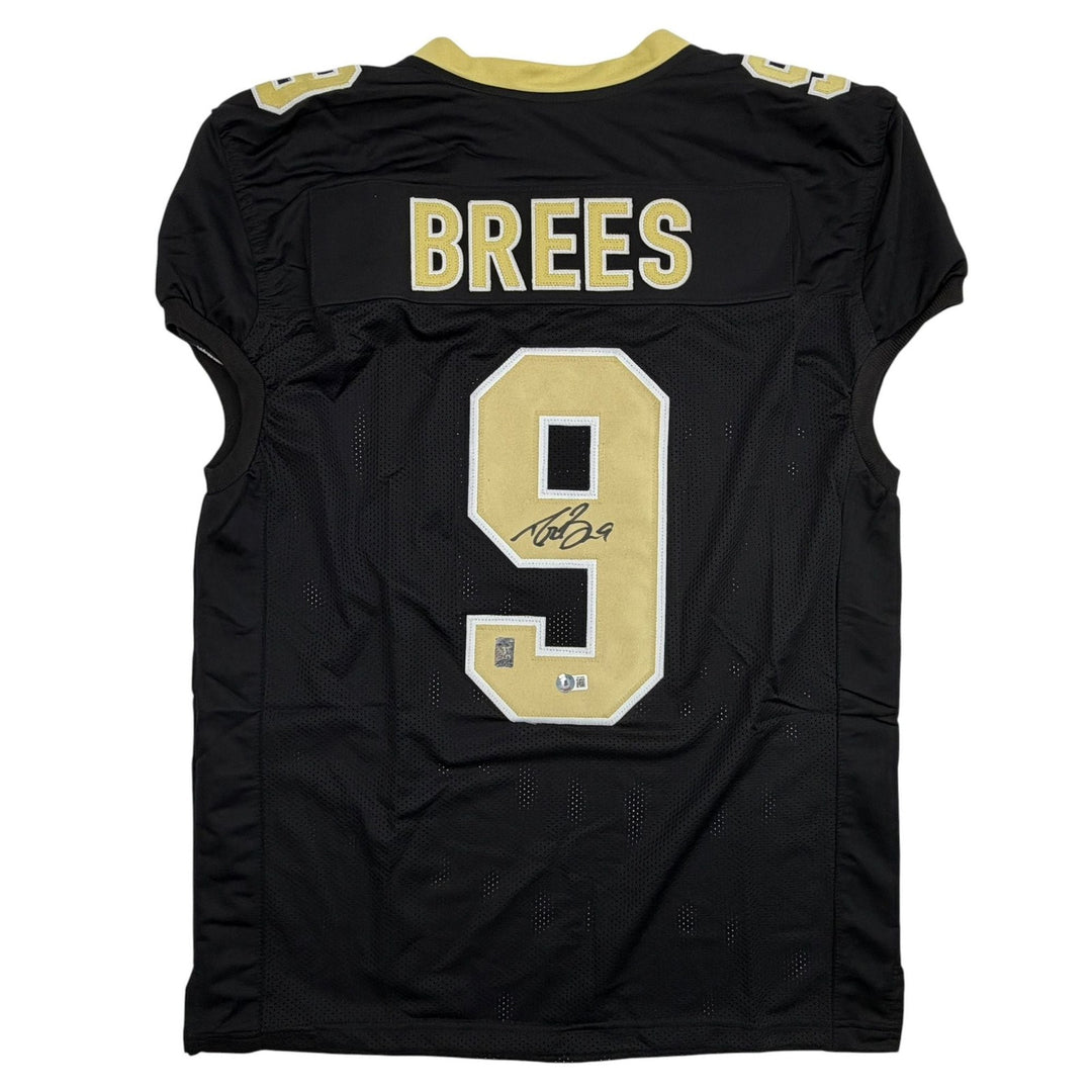 Autographed/Signed Drew Brees New Orleans Black Pro Cut Jersey Beckett COA