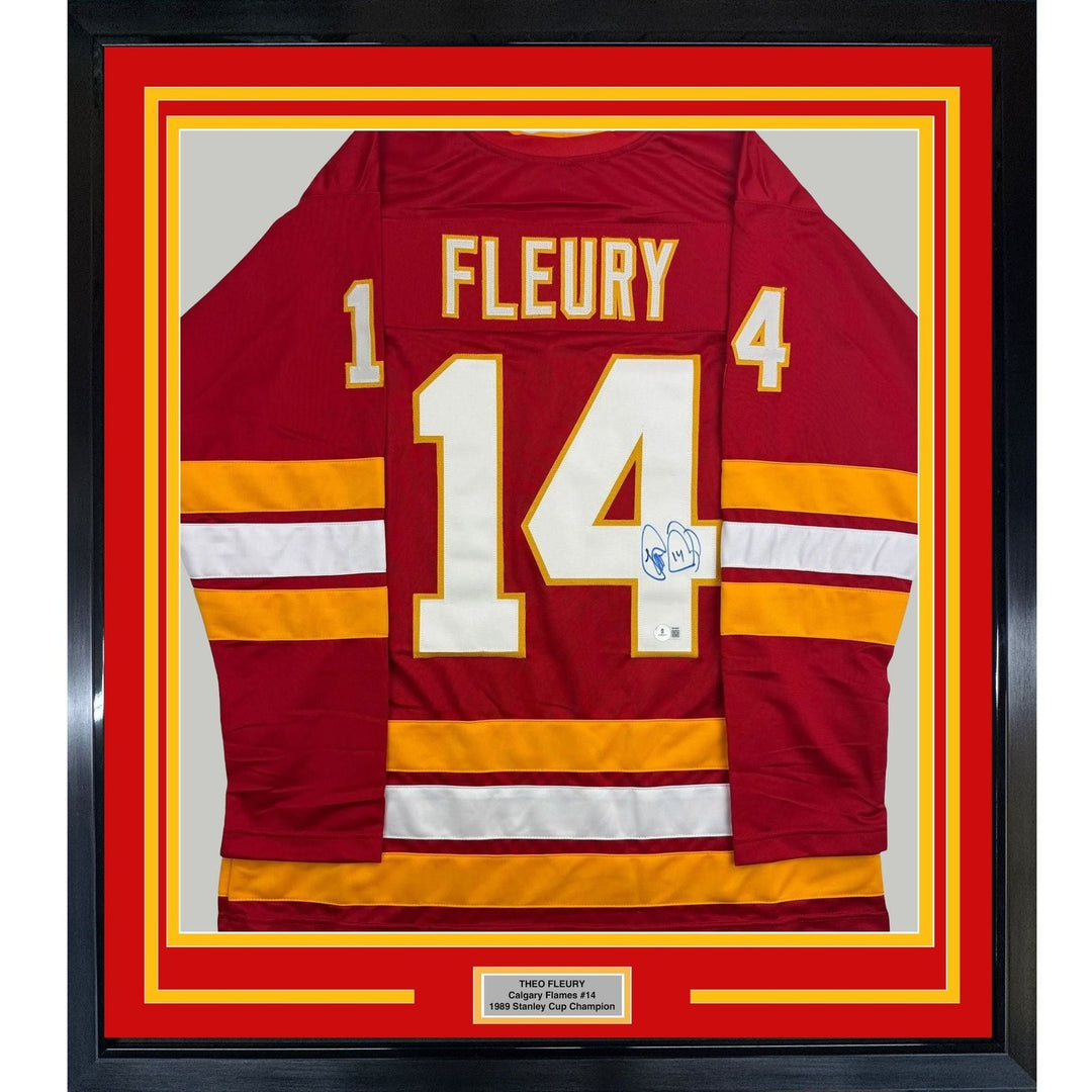 Framed Autographed/Signed Theo Fleury 35x39 Calgary Red Jersey Beckett COA