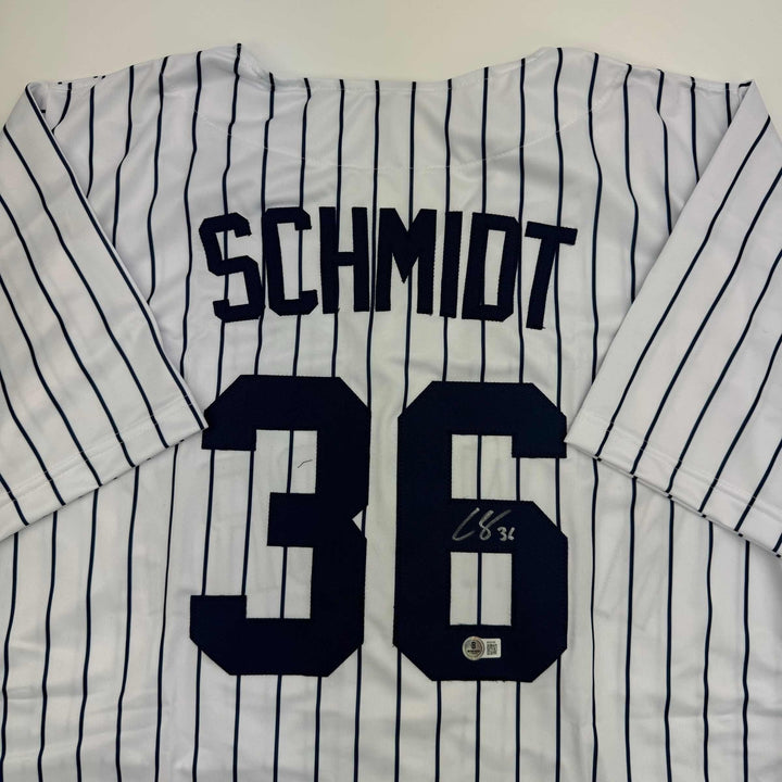 Autographed/Signed Clarke Schmidt New York Pinstripe Baseball Jersey BAS COA