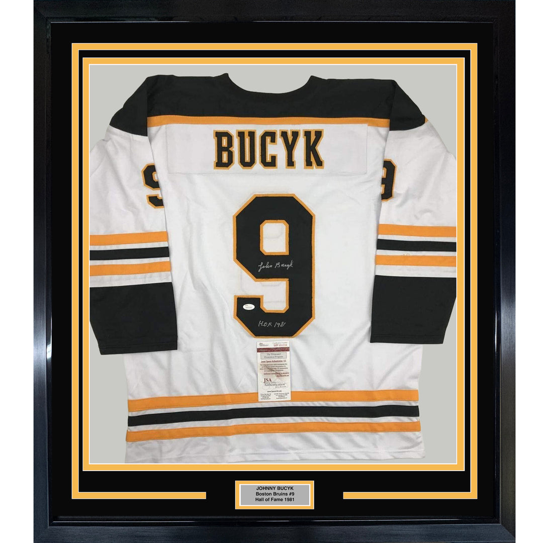 FRAMED Autographed/Signed JOHNNY JOHN BUCYK 33x42 Boston White Jersey JSA COA