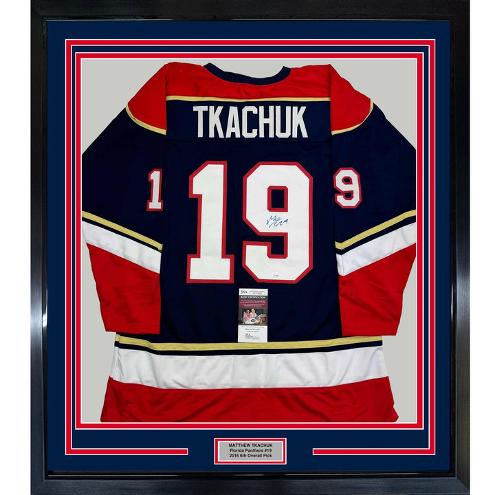 Framed Autographed/Signed Matthew Tkachuk 35x39 Florida Blue Jersey JSA COA