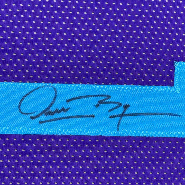 Framed Autographed/Signed Muggsy Bogues 33x42 Charlotte Purple Jersey COA