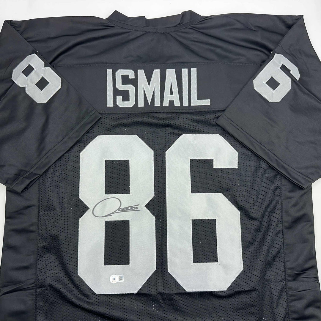 Autographed/Signed Raghib Ismail Rocket Oakland Black Jersey Beckett BA