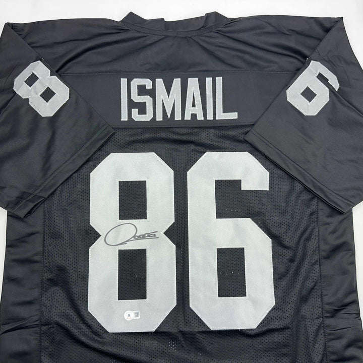 Autographed/Signed Raghib Ismail Rocket Oakland Black Football Jersey Beckett BA