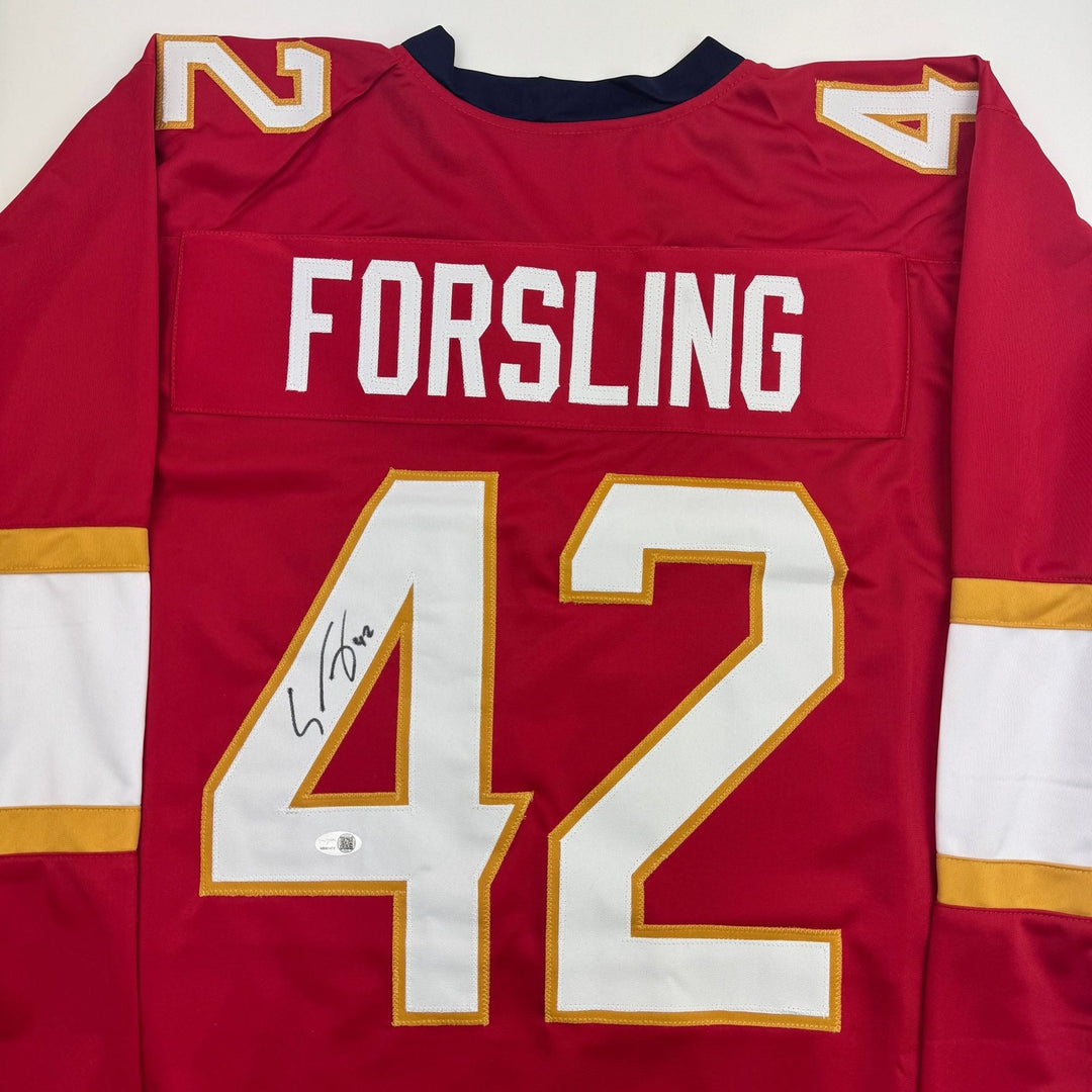 Autographed/Signed Gustav Forsling Florida Red Hockey Jersey JSA COA