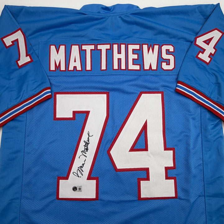Autographed/Signed Bruce Matthews Houston Blue Football Jersey Beckett COA