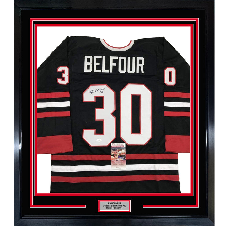 Framed Autographed/Signed Ed Belfour 35x39 Chicago Black Hockey Jersey JSA COA