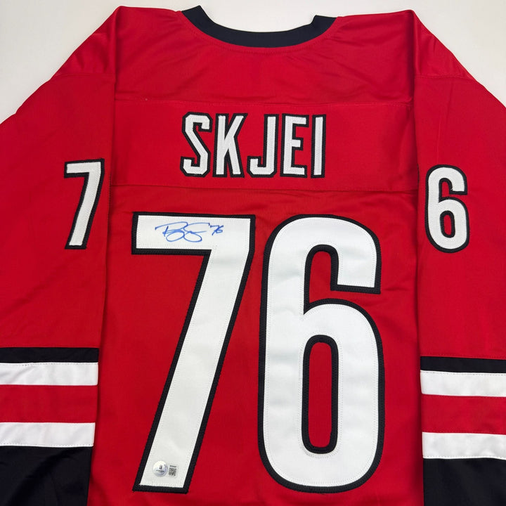 Autographed/Signed Brady Skjei Carolina Red Hockey Jersey BAS COA