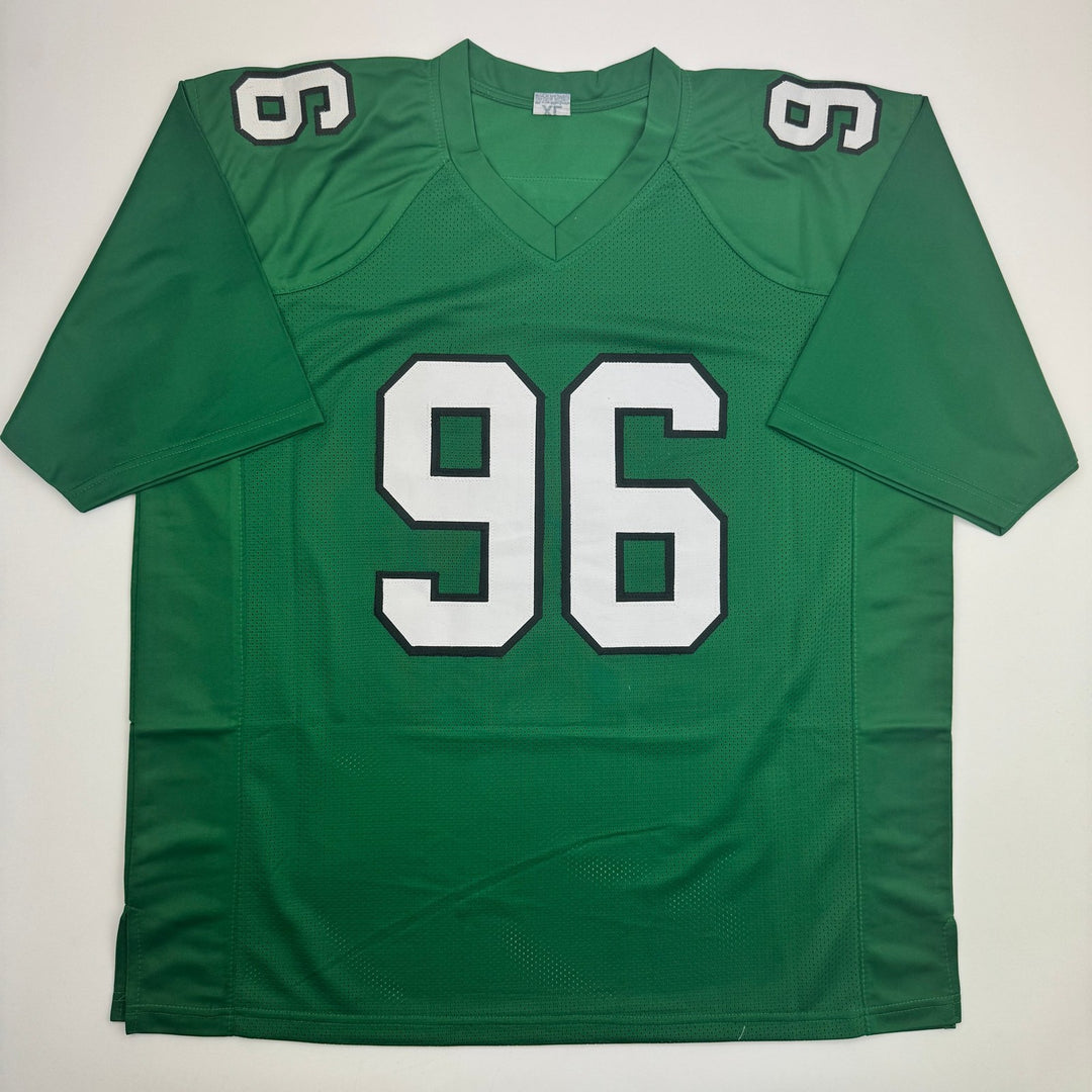 Autographed/Signed Clyde Simmons Philadelphia Green Football Jersey Beckett COA