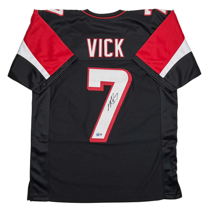 Autographed/Signed MICHAEL MIKE VICK Atlanta Black Jersey PSA/DNA COA