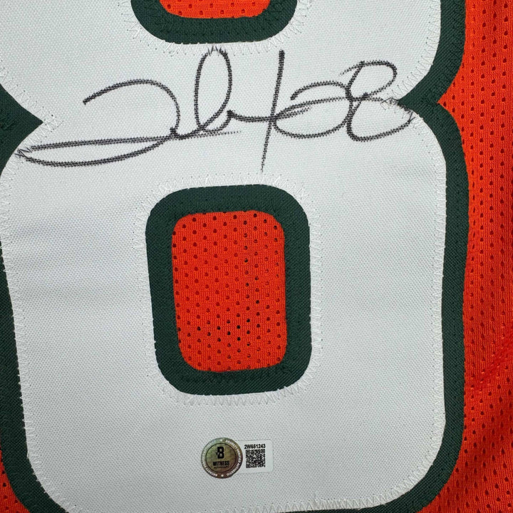 Autographed/Signed Clinton Portis Miami Orange College Jersey Beckett BAS COA