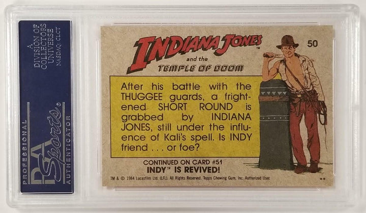Jonathan Ke Quan signed 1984 Topps Indiana Jones #50 Grabbed by Indy Card ~ PSA