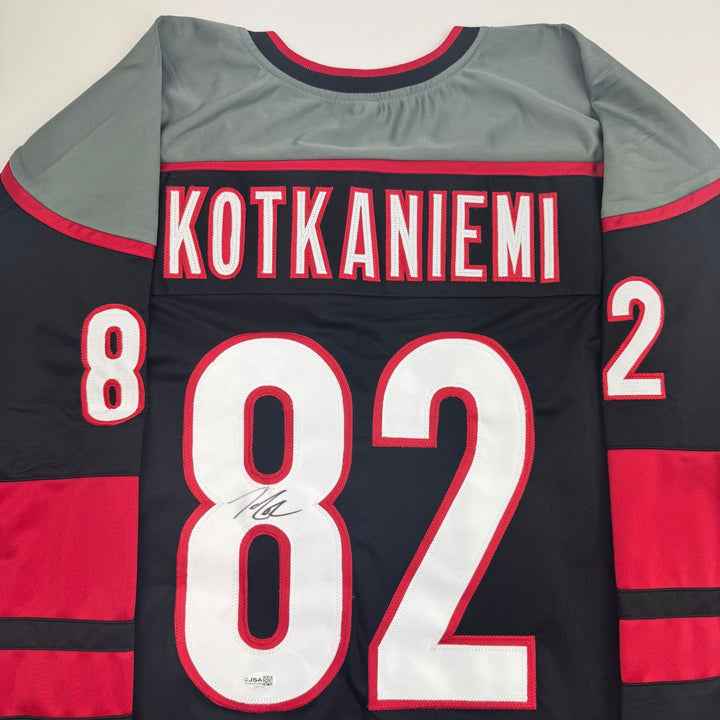 Autographed/Signed Jesperi Kotkaniemi Carolina Black Jersey Beckett BAS COA