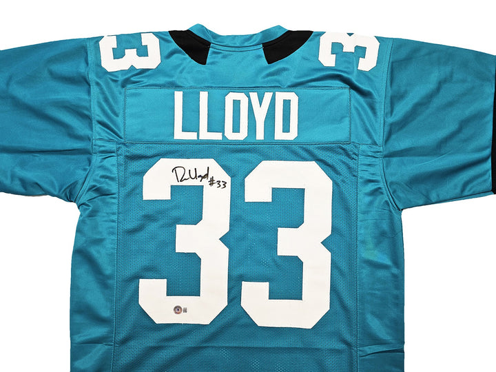 Jacksonville Jaguars Devin Lloyd Signed Teal Jersey Beckett Witness