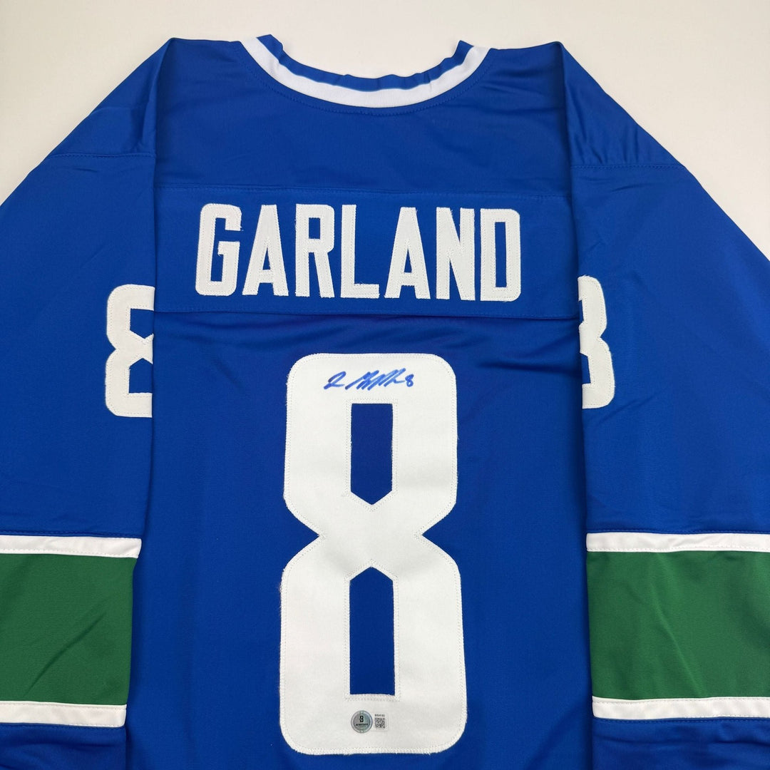Autographed/Signed Conor Garland  Vancouver Blue Hockey Jersey BAS COA