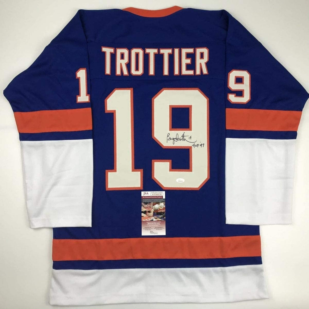 Autographed/Signed Bryan Trottier HOF 97 New York Blue Jersey JSA COA