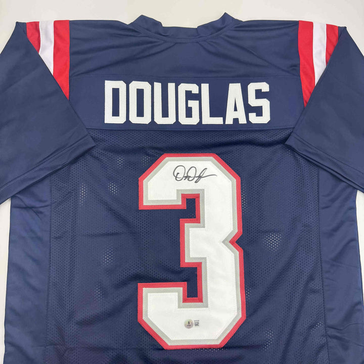 Autographed/Signed DeMario Douglas New England Blue Jersey Beckett BAS COA