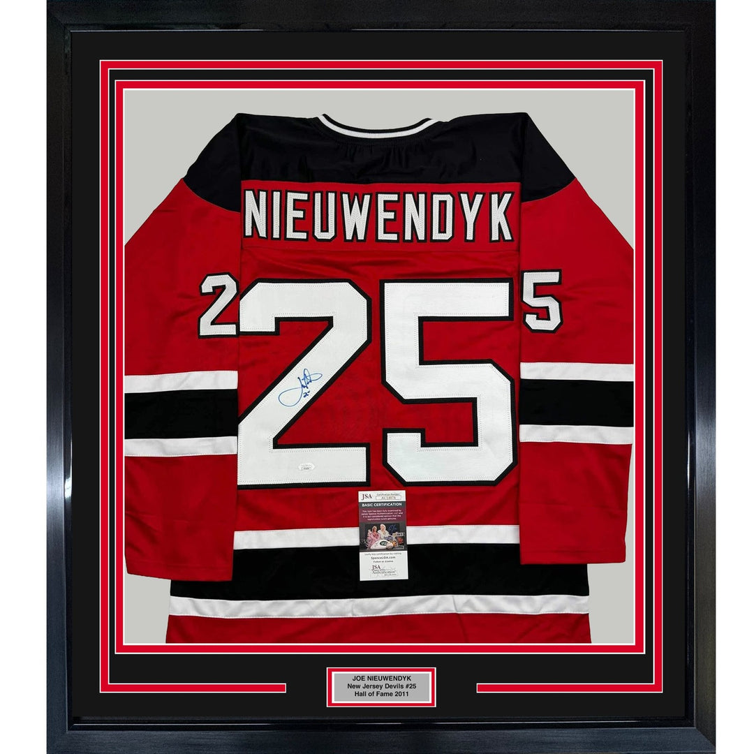 Framed Signed Joe Nieuwendyk 35x39 New Jersey Red Jersey JSA COA