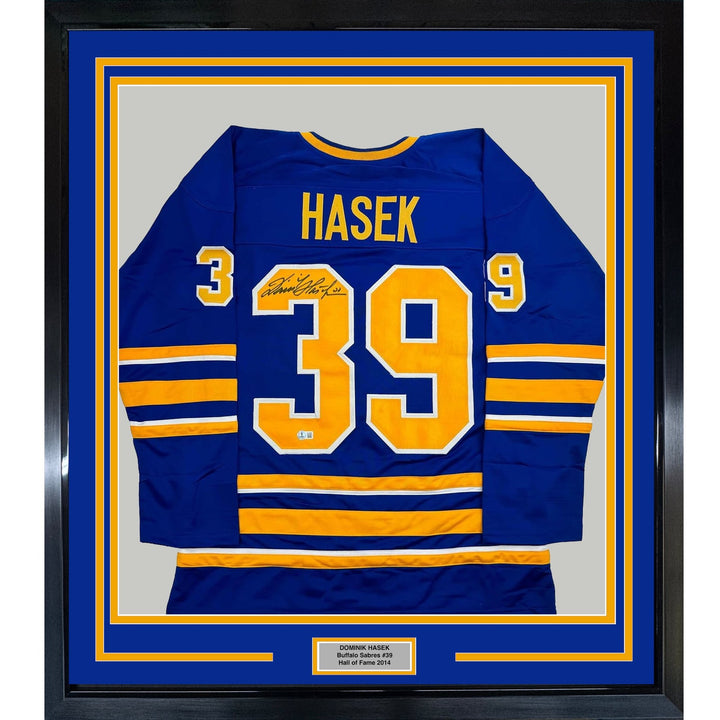 Framed Autographed/Signed Dominik Hasek 35x39 Buffalo Blue Jersey BAS COA