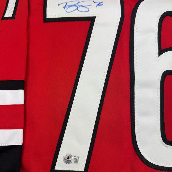 Autographed/Signed Brady Skjei Carolina Red Hockey Jersey BAS COA