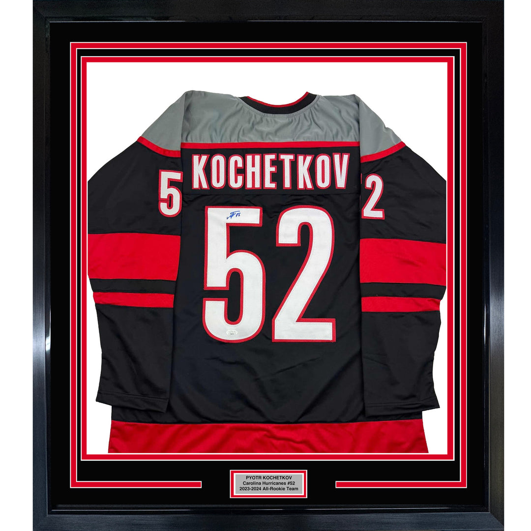 Framed Autographed/Signed Pyotr Kochetkov 35x39 Carolina Black Jersey JSA COA