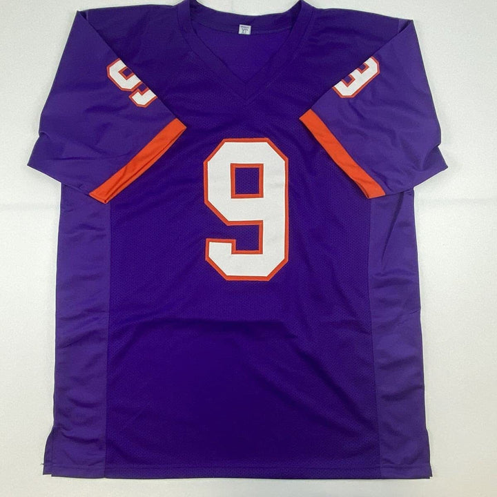 Autographed/Signed TRAVIS ETIENNE Clemson Purple College Football Jersey JSA COA